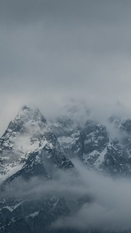 雪山云雾缭绕灰蓝自然风景手机壁纸