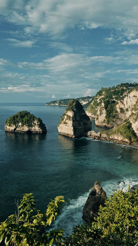 海蚀拱门礁石碧海蓝天风景手机壁纸