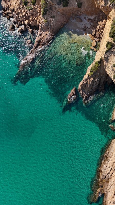 碧海悬崖俯瞰清澈蓝绿风景手机壁纸