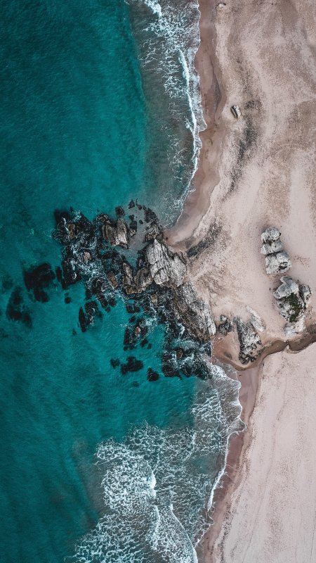 碧海白沙礁石海岸蓝白风景手机壁纸