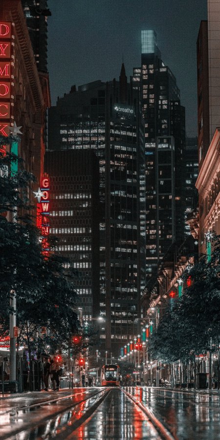 城市夜景霓虹闪烁蓝黑建筑手机壁纸