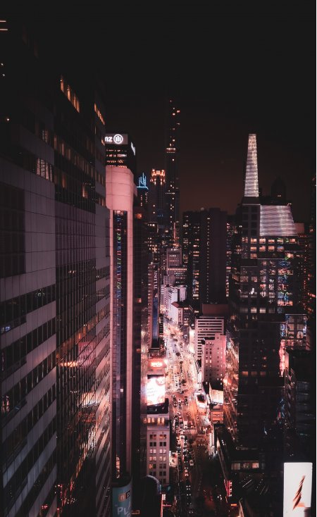 纽约时代广场夜景霓虹璀璨暗红城市建筑手机壁纸
