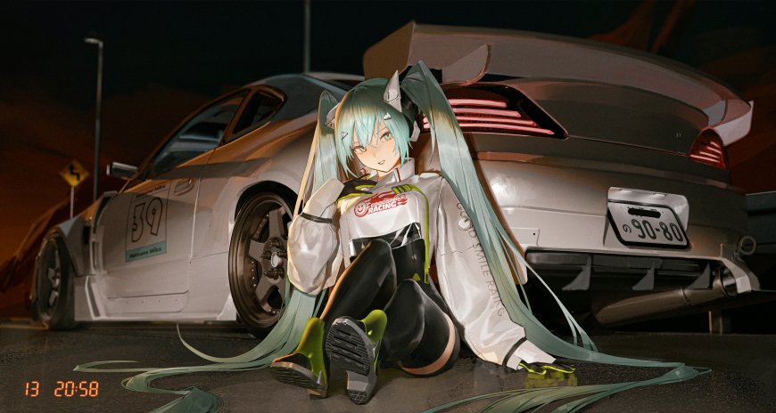初音未来赛车服坐地夜景蓝绿动漫电脑壁纸