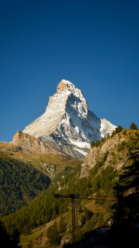 马特洪峰雪顶巍峨蓝白风景手机壁纸