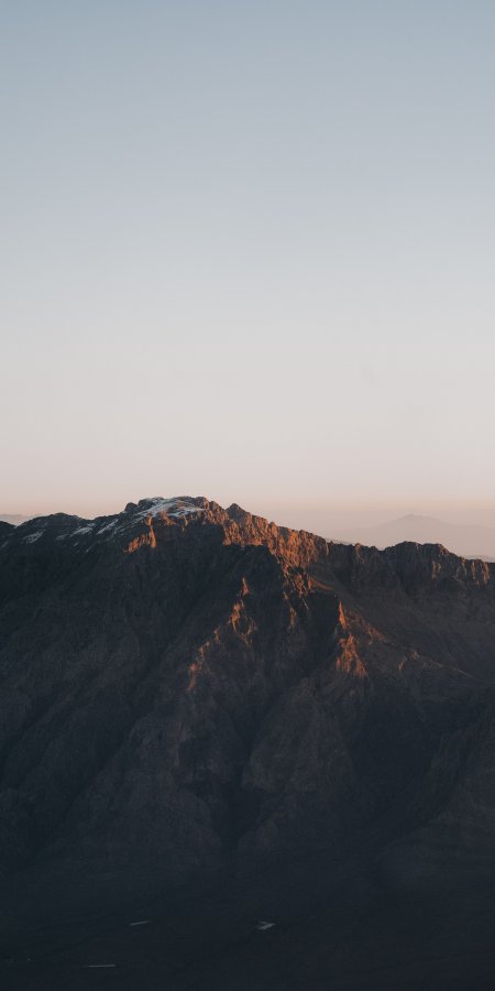 巍峨山峰夕照金辉蓝灰风景手机壁纸