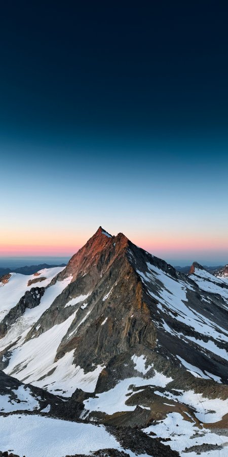 雪山峰顶晨曦染红蓝白风景手机壁纸