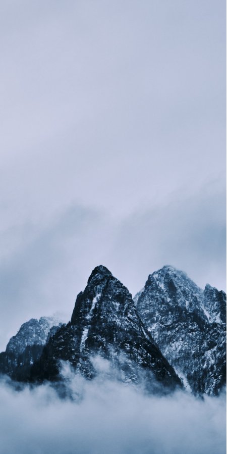 雪山云海缭绕蓝灰风景手机壁纸精选