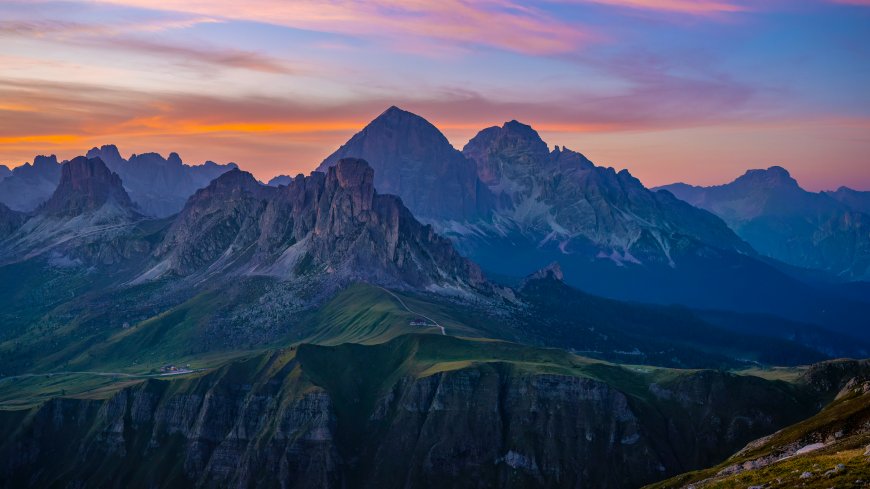 阿尔卑斯山峰夕照橙紫风景电脑壁纸