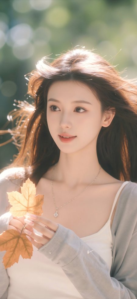 秋日少女手持枫叶暖金人物摄影手机壁纸
