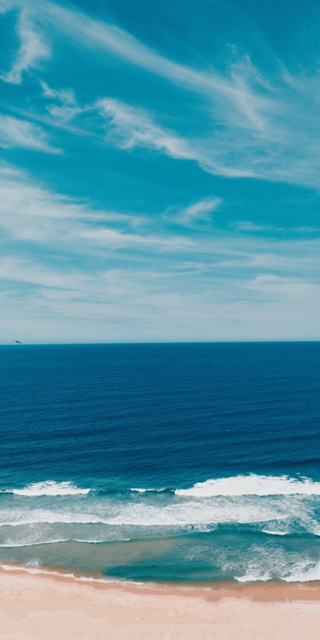 蔚蓝大海白浪拍岸粉沙海岸风景手机壁纸