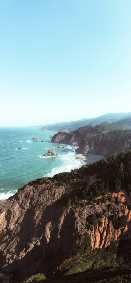 美国俄勒冈州海岸悬崖海浪森林蓝绿风景手机壁纸