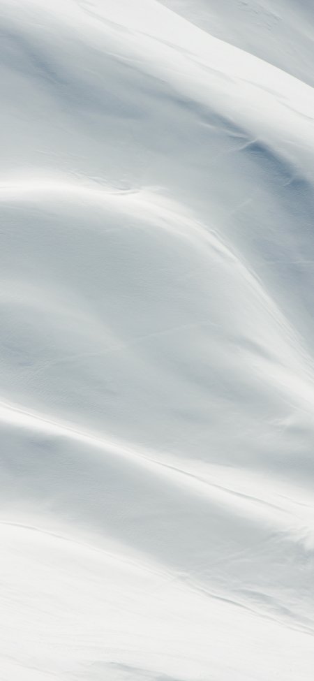 雪山雪坡蜿蜒起伏蓝白自然风景手机壁纸