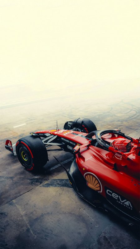 法拉利F1赛车红黑涂装赛道停驻暖灰汽车手机壁纸