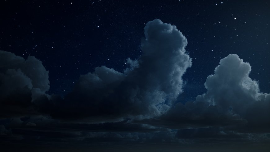 深邃夜空繁星点点云层翻涌暗蓝太空科幻电脑壁纸