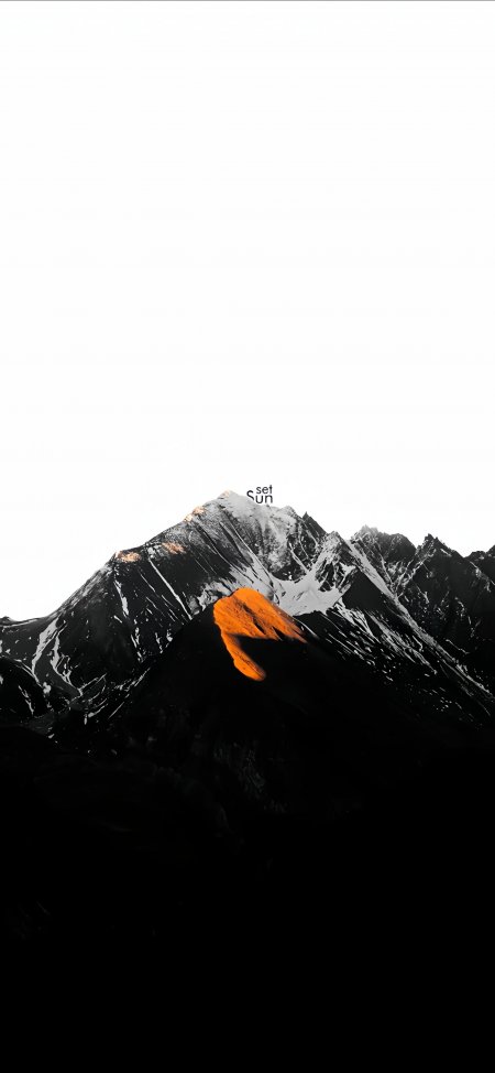 雪山峰顶橙光映照黑白对比暗调风景手机壁纸