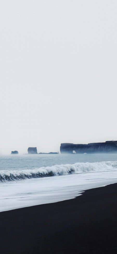 冰岛黑沙滩海浪拍岸灰蓝自然风景手机壁纸