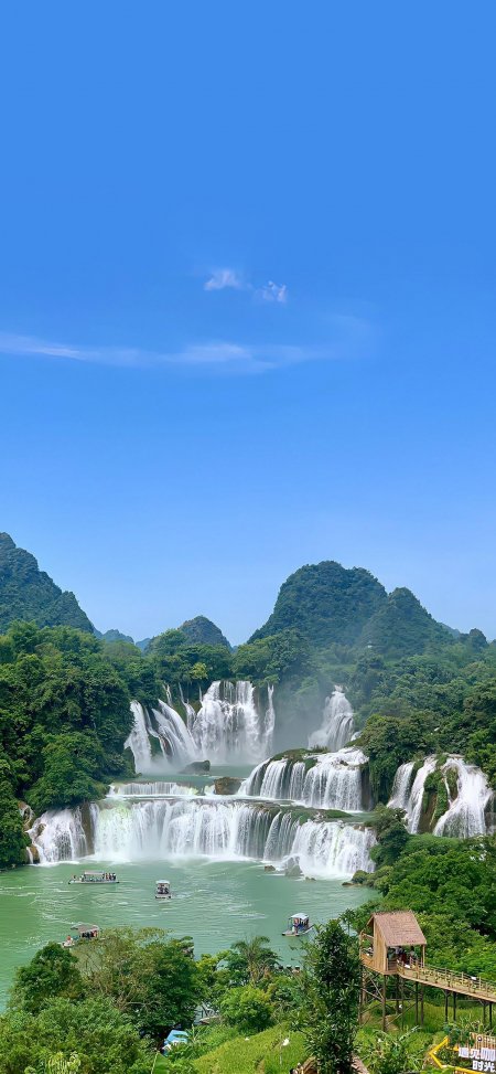德天瀑布层叠飞泻碧水青山蓝空风景手机壁纸