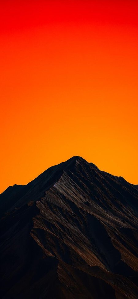 巍峨山峰剪影橙红渐变天空自然风景手机壁纸