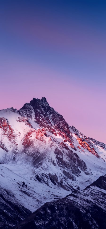 雪山巍峨峰顶染霞紫蓝渐变风景手机壁纸